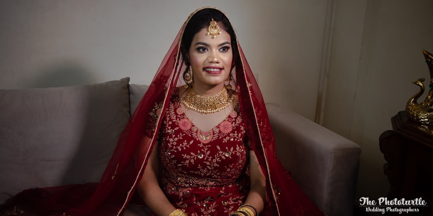 bride picture in a red lehenga in mumbai